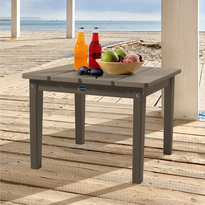 Tan Sunrise Coast large side table with drinks, fruit, and sunglasses