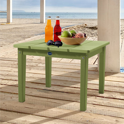 Green Sunrise Coast large side table with drinks, fruit, and sunglasses