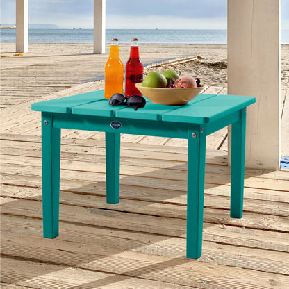 Blue Sunrise Coast large side table with drinks, fruit, and sunglasses