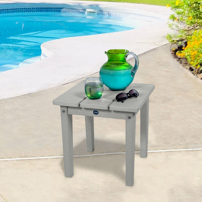 Gray Sunrise Coast small side table with water and sunglasses by a pool