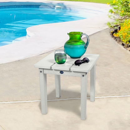 White Sunrise Coast small side table with water and sunglasses by a pool