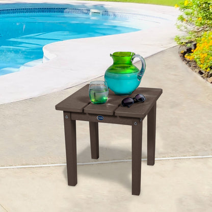 Brown Sunrise Coast small side table with water and sunglasses by a pool