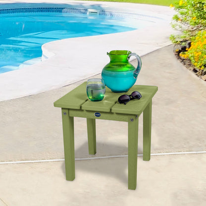 Green Sunrise Coast small side table with water and sunglasses by a pool
