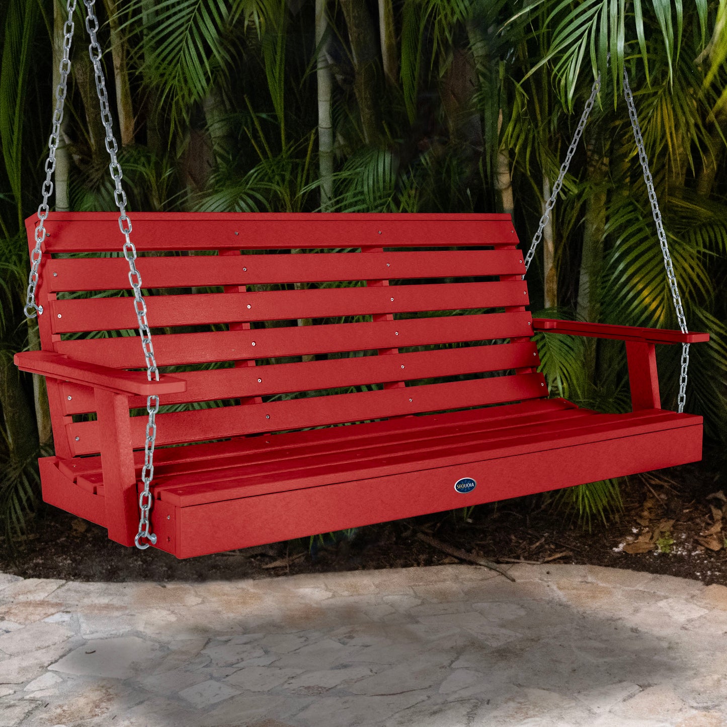 Red Sunrise Coast 5ft porch swing with palms in background