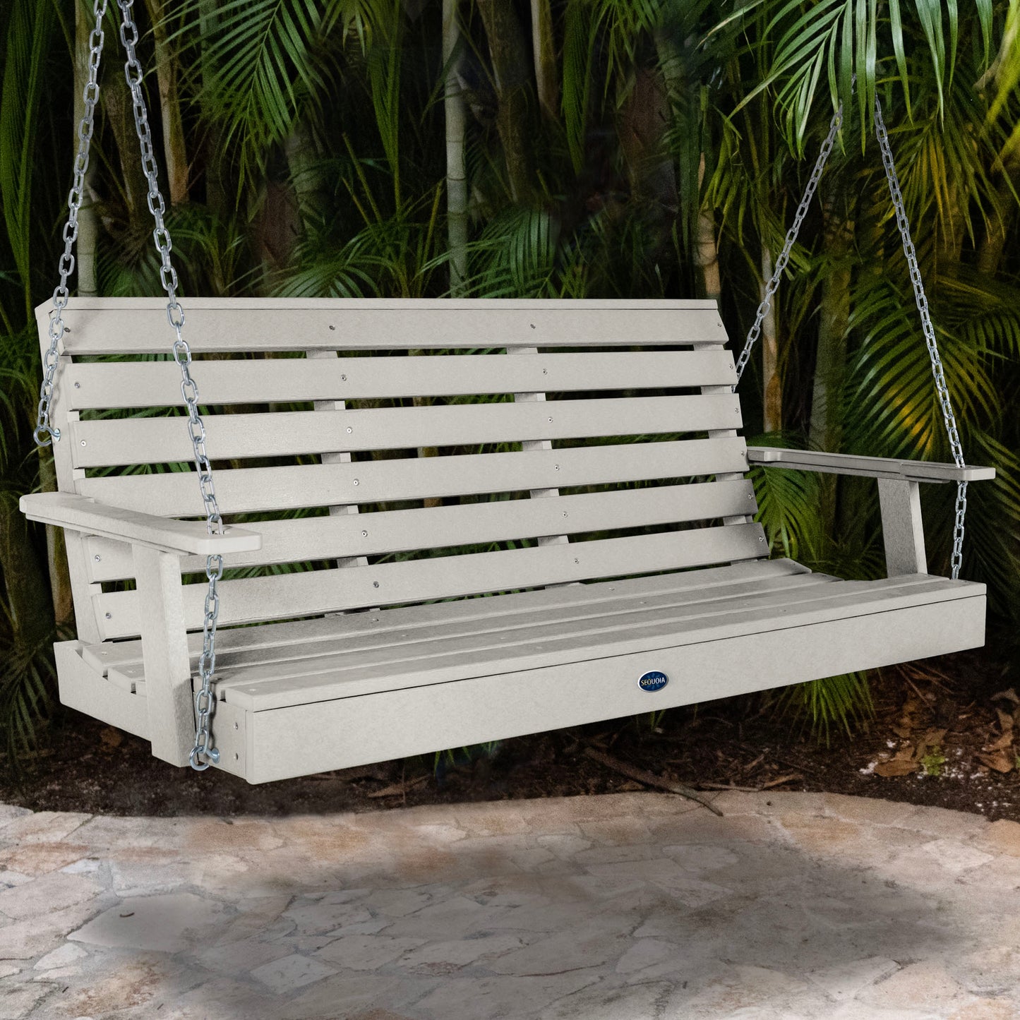 Gray Sunrise Coast 5ft porch swing with palms in background