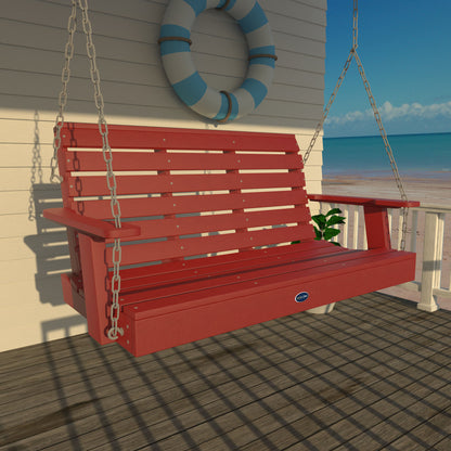 Red Sunrise Coast 4ft porch swing on a deck with life preserver