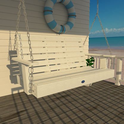 White Sunrise Coast 4ft porch swing on a deck with life preserver