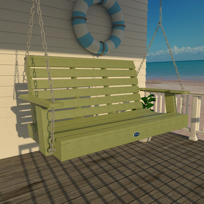 Green Sunrise Coast 4ft porch swing on a deck with life preserver