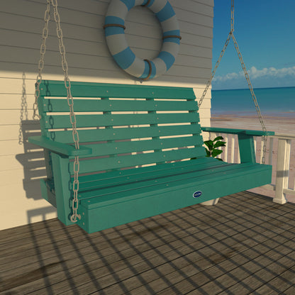 Blue Sunrise Coast 4ft porch swing on a deck with life preserver