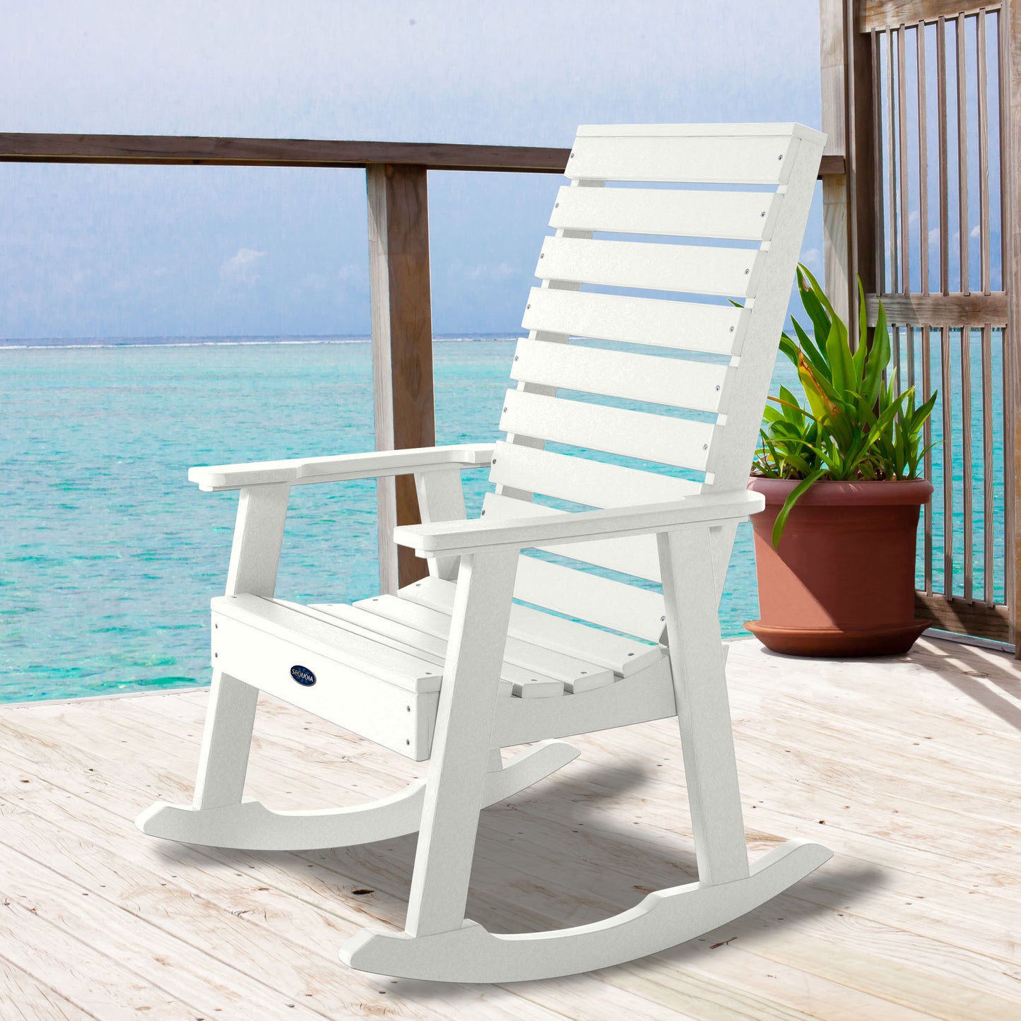 White Sunrise Coast rocking chair on deck overlooking water